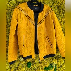 Unique mustard yellow bomber jacket w exquisite lining and small fringes on back